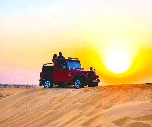 Jeep safari through the Sam Sand Dunes at sunset
