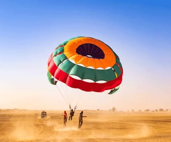 Parasailing adventure over the Jaisalmer desert landscape