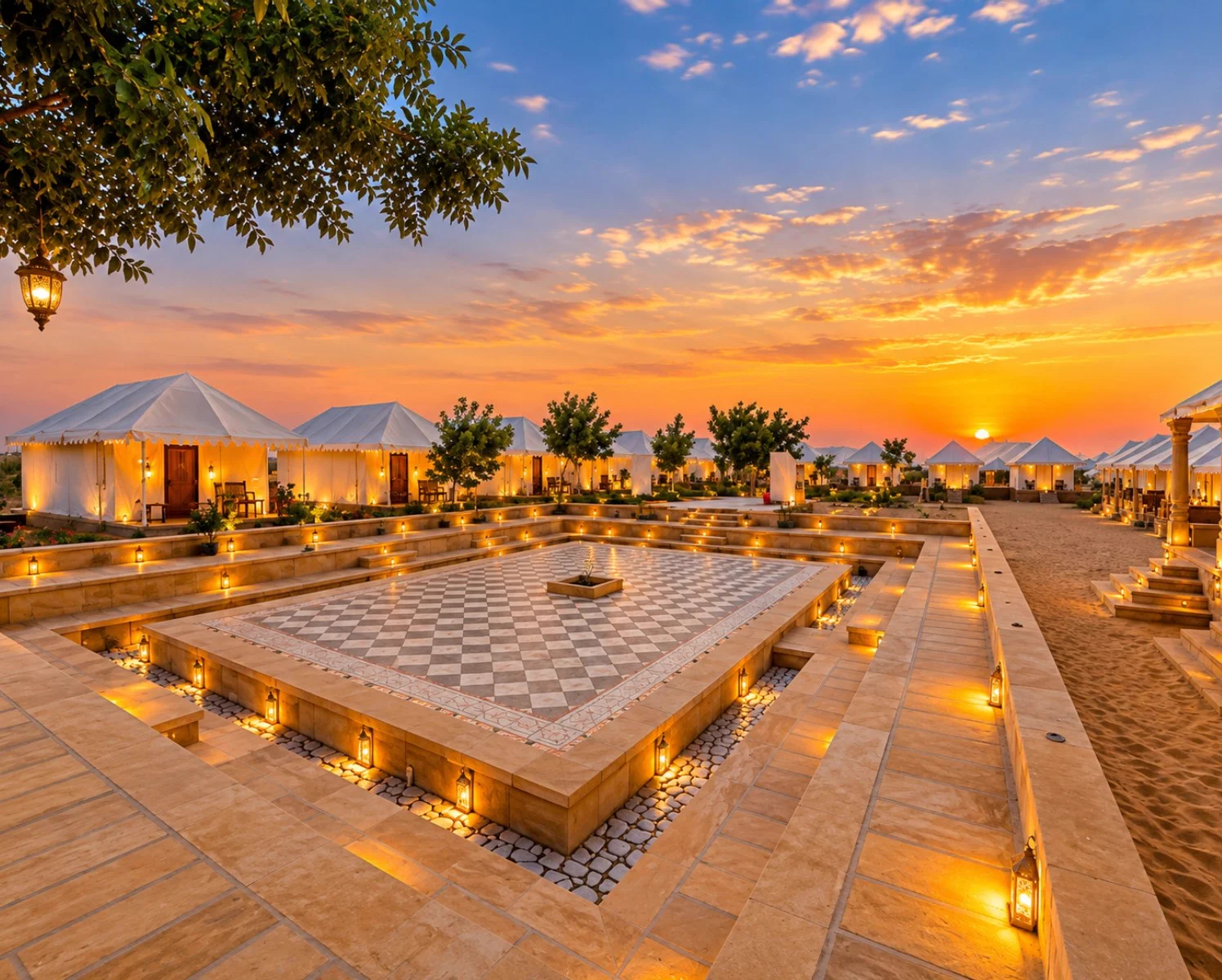 Serendipity Desert Camp courtyard glowing with lanterns at golden sunset